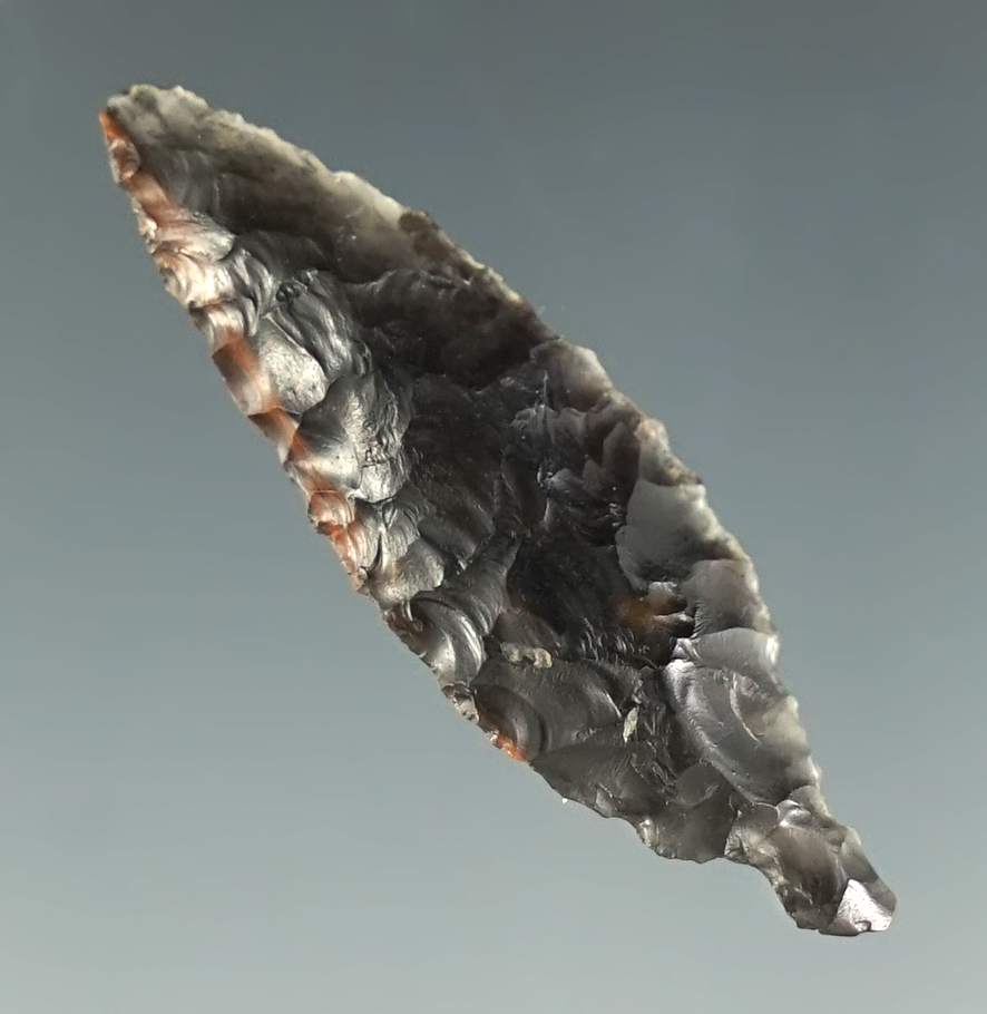 1 3/8" Unique Pin Stem Point made from triple flow Obsidian found in Oregon.