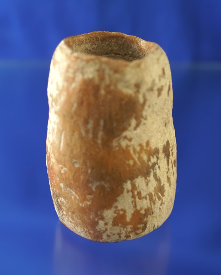 2 3/8" pottery vessel found in a cave by the lower Pecos River, Texas which is completely intact.