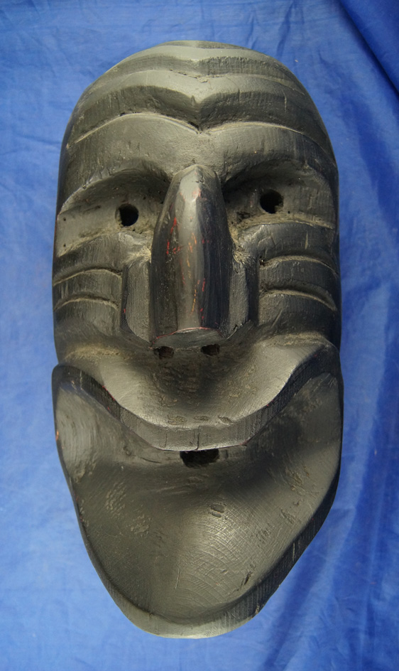 11 3/4" Tall Carved Wooden Mask.