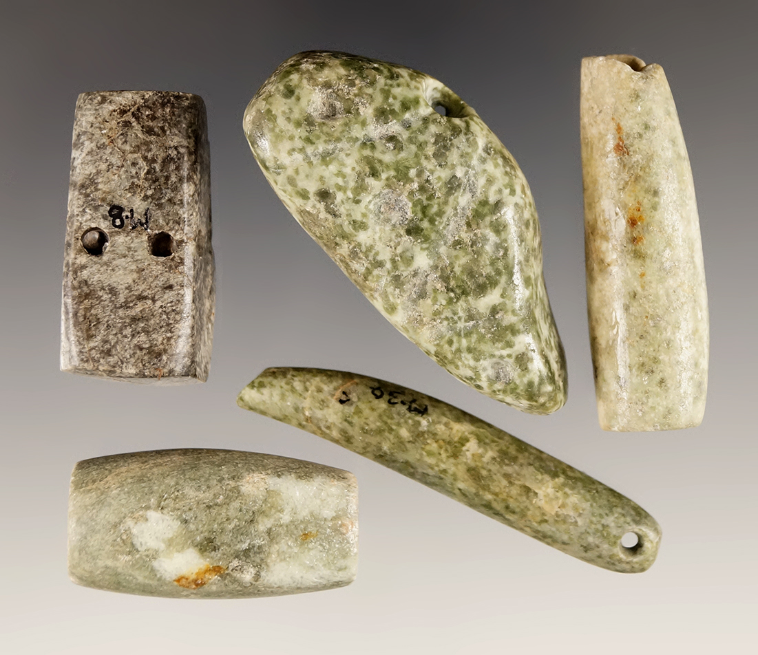 Set of 5 drilled Pre-Columbian Hardstone beads found in Mesoamerica. Largest is 2".