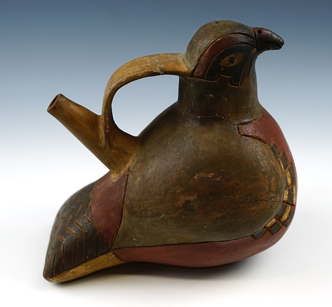 6" Long Pre-Columbian Paracas Culture bird effigy pottery vessel found in Peru. Head reattached.