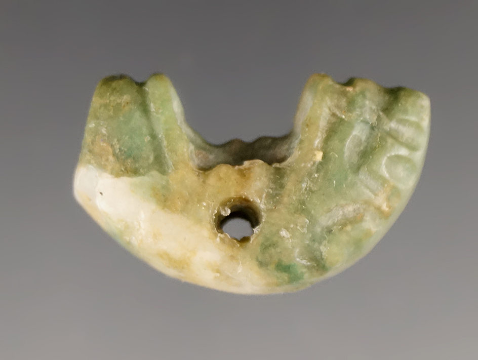 Intricate carving on this 13/16" effigy Pre-Columbian bead found in Mesoamerica.