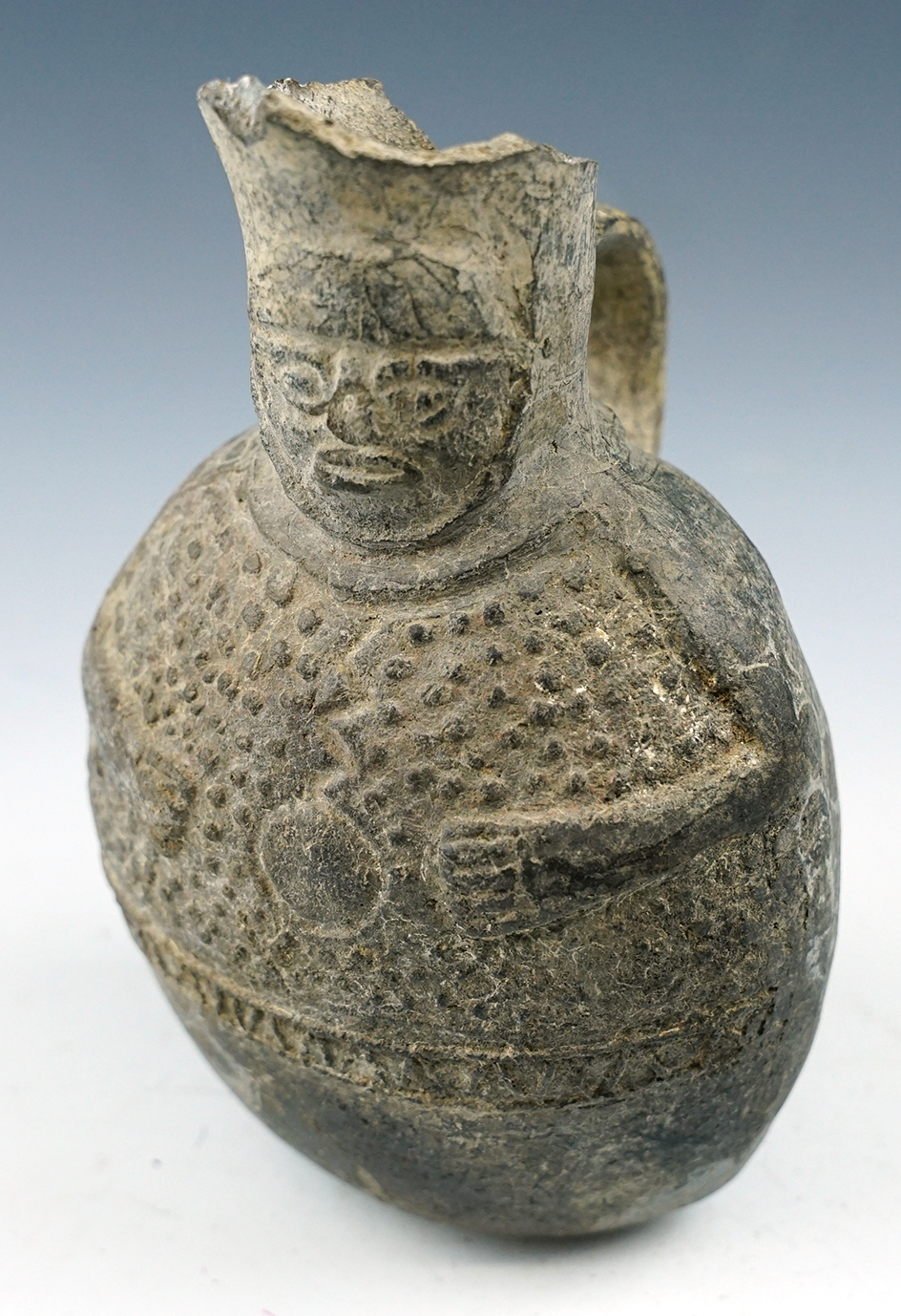 6 1/2" Tall Pre-Columbian Chimu Culture pottery vessel with some damage to spout. Found in Peru.