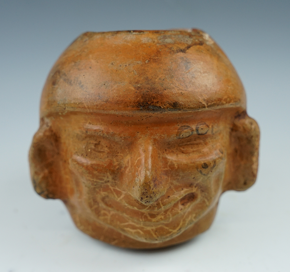 4" tall x 4 1/4" wide Moche head pot with nice worm tacks on surface found in Peru.