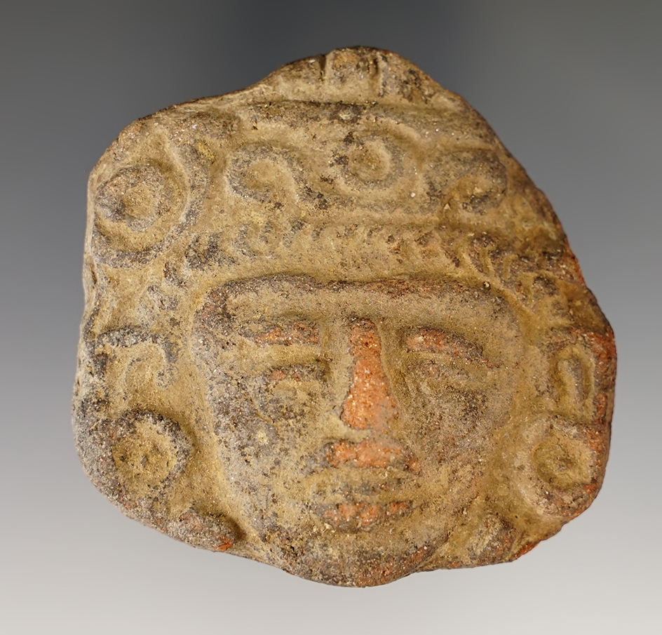 2 5/8" tall well styled Pre-Columbian pottery applique in very nice condition.