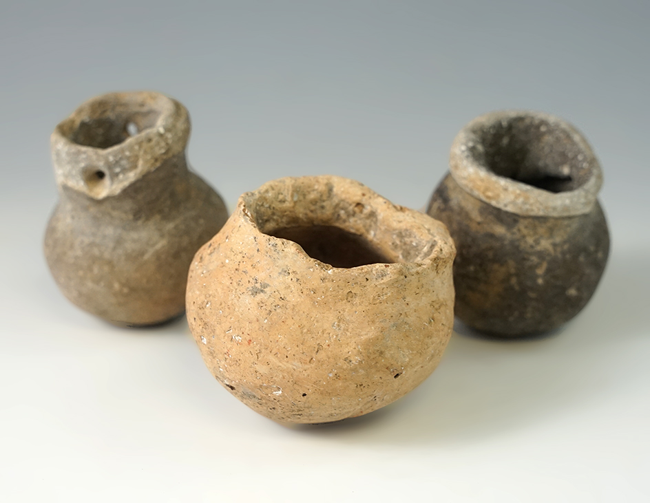 Set of three miniature Mississippian pots anciently salvaged from tripod pottery legs/feet.