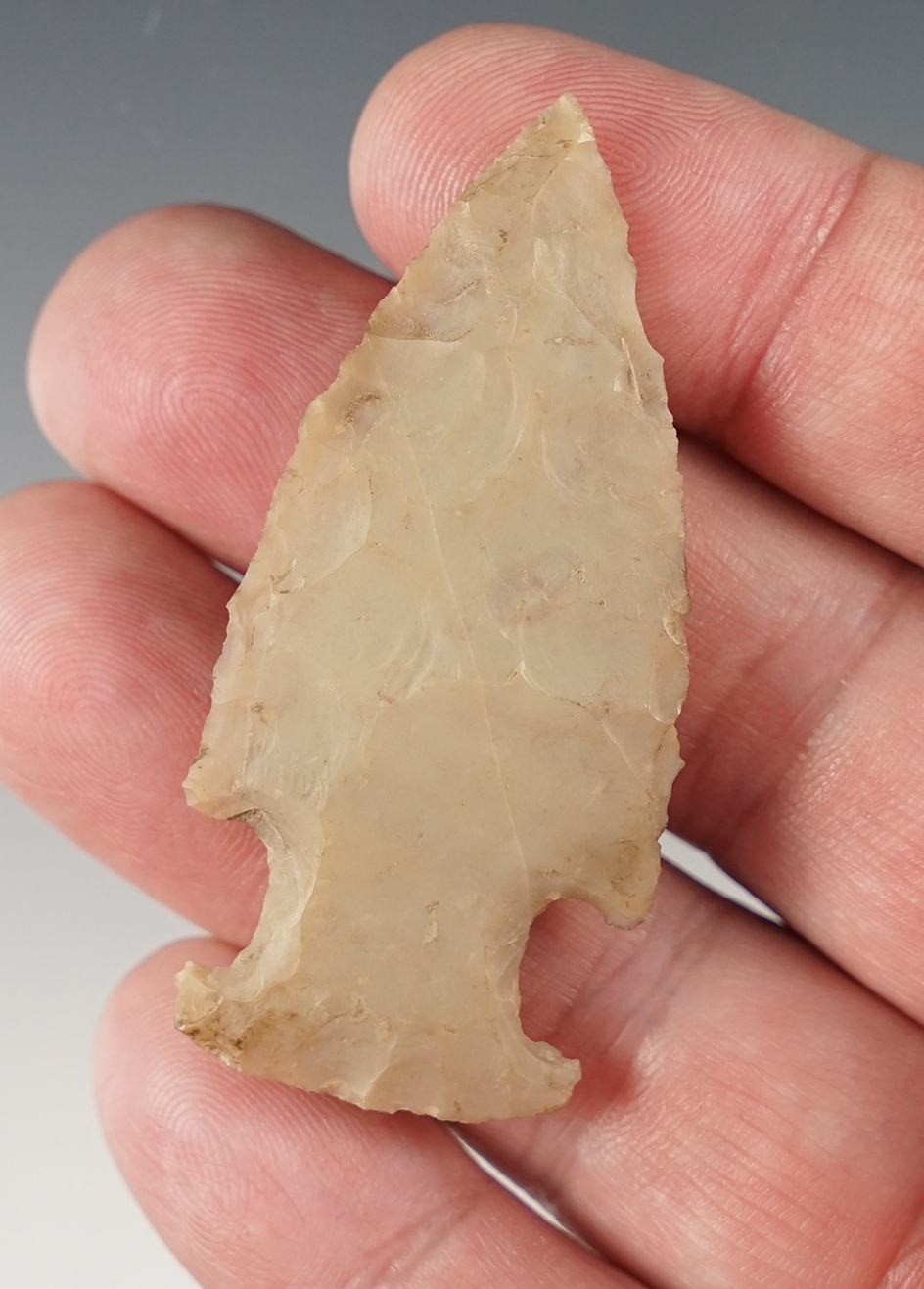 Well styled 2 5/16" Hopewell made from patinated Flint Ridge Flint. Found in Pickaway Co., Ohio. 