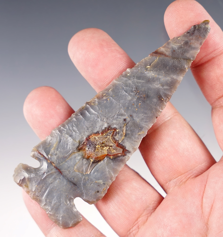 4" Archaic Sidenotch Point made of semi-translucent Flint Ridge. Found in Marion Co., Ohio. COA.