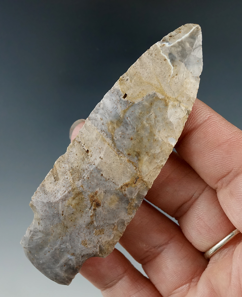 Attractive material coloring on this 3 1/2" stemmed knife found in Illinois.