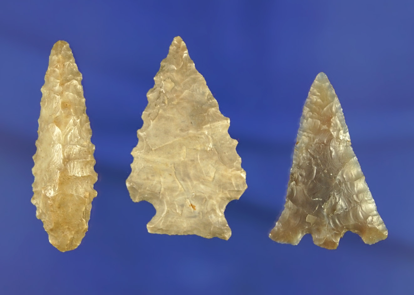 Set of three assorted arrowheads - the 1 5/16" nicely made Eastgate is broken and glued.