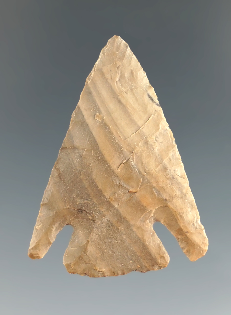 1 9/16" Well styled Cornernotch made from banded tan Flint found in Texas.