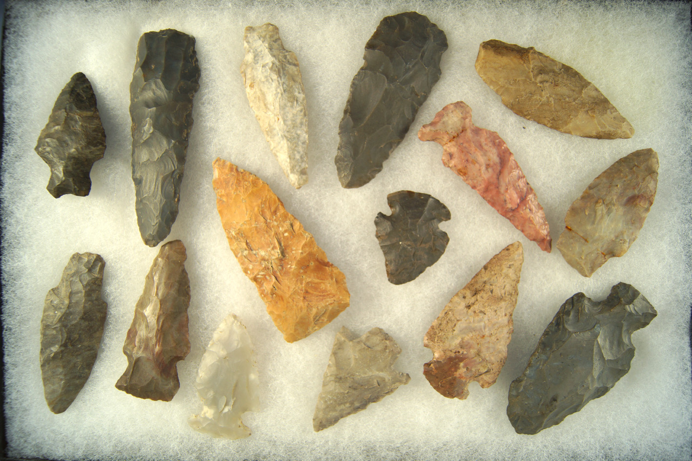 Set of 15 assorted arrowheads and knives from the Midwest, largest is 3 5/8". Ex. Cowan Hood.