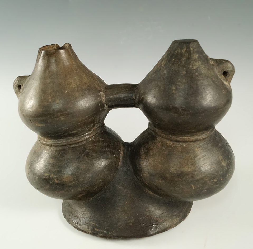 Sican dual chamber vessel.  Spout was damaged and salvage in ancient times. 6 1/2" wide by 5" tall.