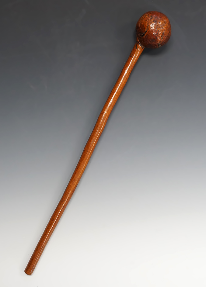 Nicely crafted & very heavily patinated 19 1/2" long Burl Wood Iroquois Club from New York.