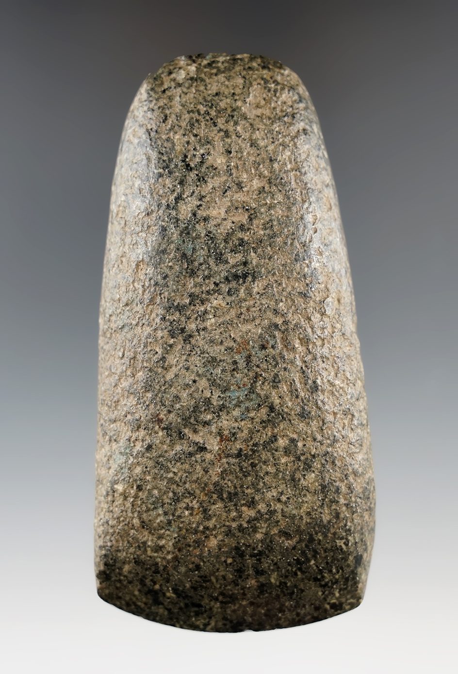 Well styled 4" Hardstone Celt with nice use polish to the bit area.