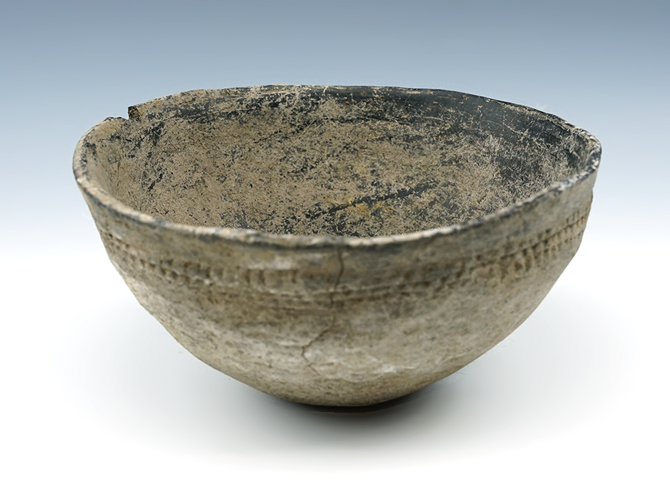 5 15/16" Prehistoric pottery bowl with attractive impressed design found in New Mexico.