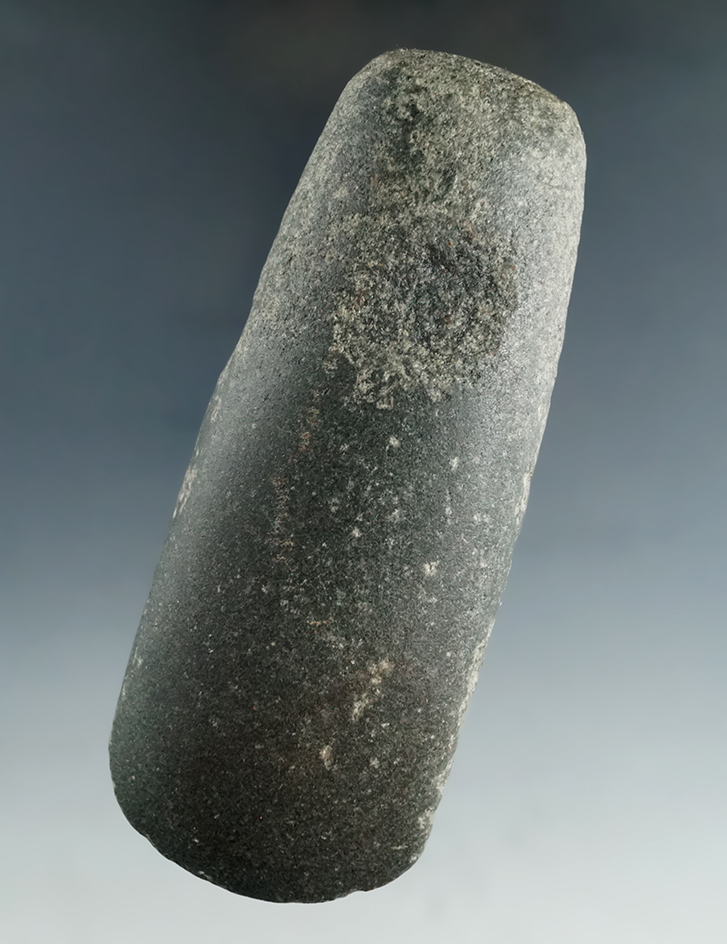 Unusually made 4 1/2" black diorite Celt that has a pocket on each side found in Franklin Co., Ohio.