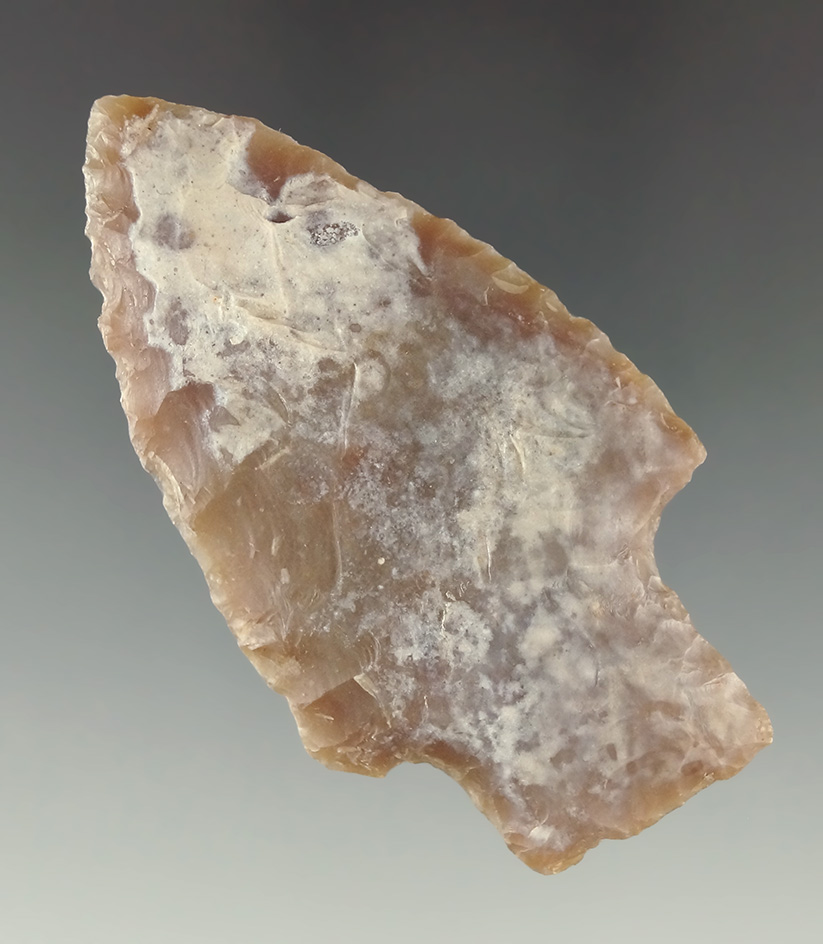 2 5/8" Lange Point made from Rootbeer Chert, found in Central Texas.