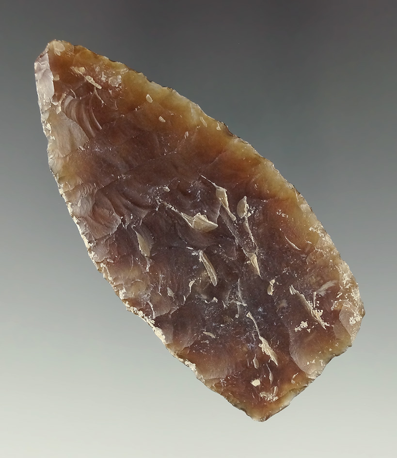 Thin 2 9/16" Knife River Flint blade found in the High Plains region.