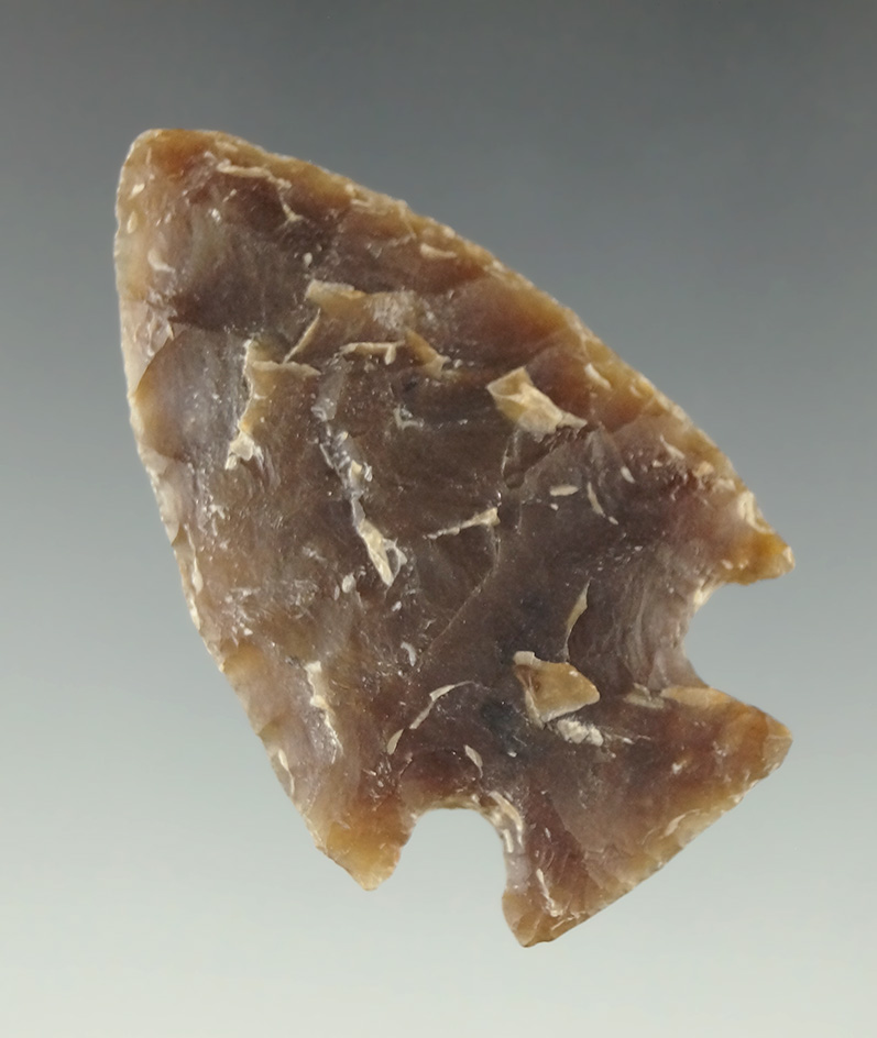 1 3/4" Knife River Flint Cornernotch found in the High Plains region.