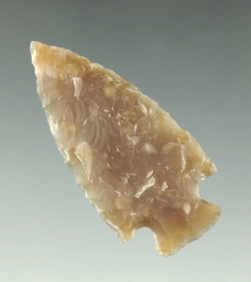 1 9/16" Knife River Flint Cornernotch that is nicely made, found in the High Plains region.