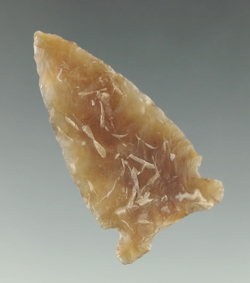 1 3/8" nicely translucent Knife River Flint Cornernotch found in the High Plains region.