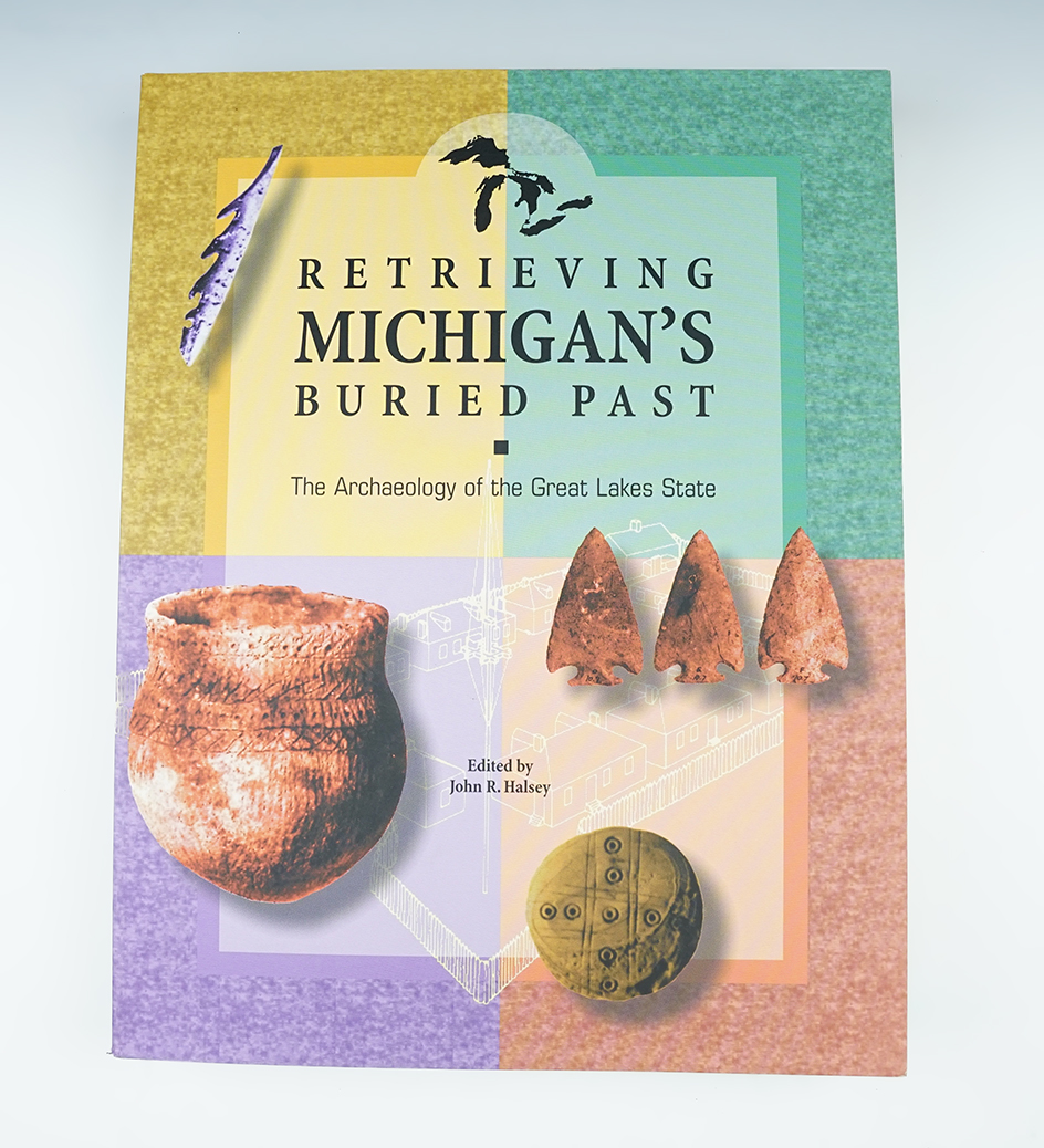 Softcover book in excellent condition "Retrieving Michigan's Buried Past" by John R. Halsey.