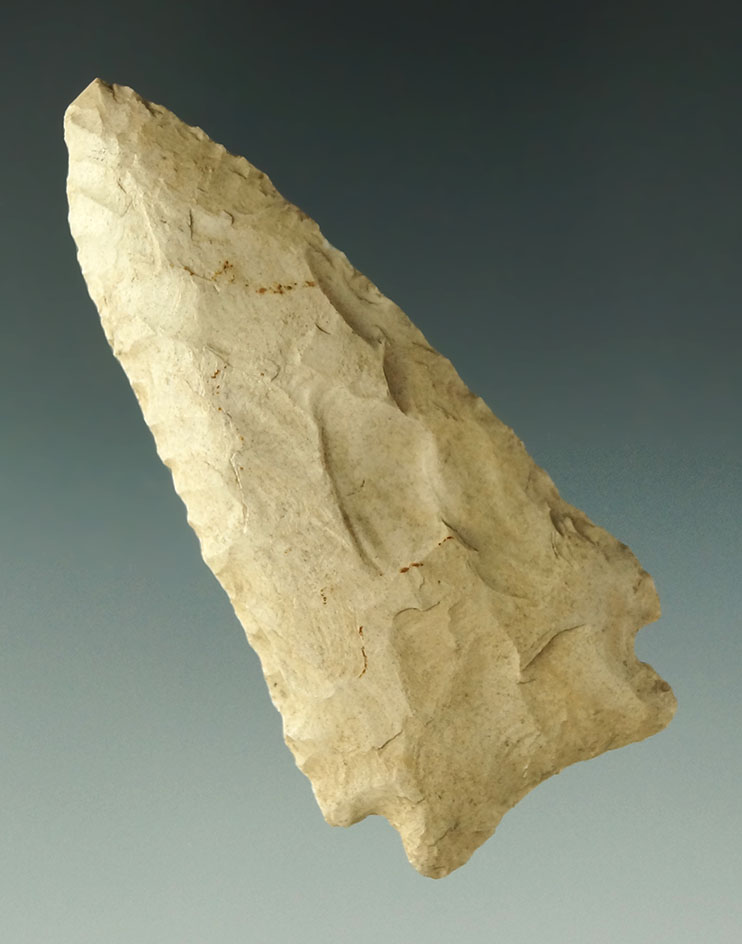 2 3/4" heavily patinated Corner notch found in Illinois.