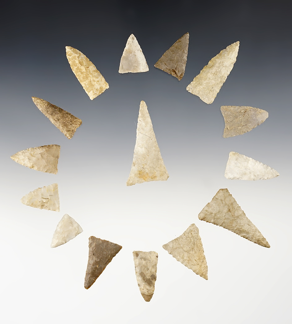 Set of 15 well patinated Midwest Triangles. The largest is 1 7/8".