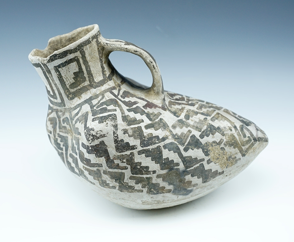 Uniquely styled 7" long Anasazi Pottery Vessel found in New Mexico.