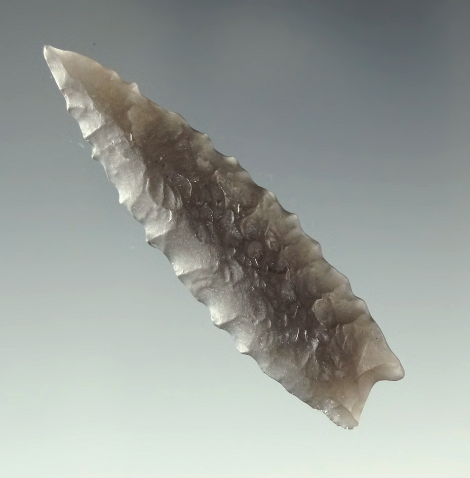 Excellent patina, flaking and style on this 2" Humboldt point - Great Basin area. Museum COA.