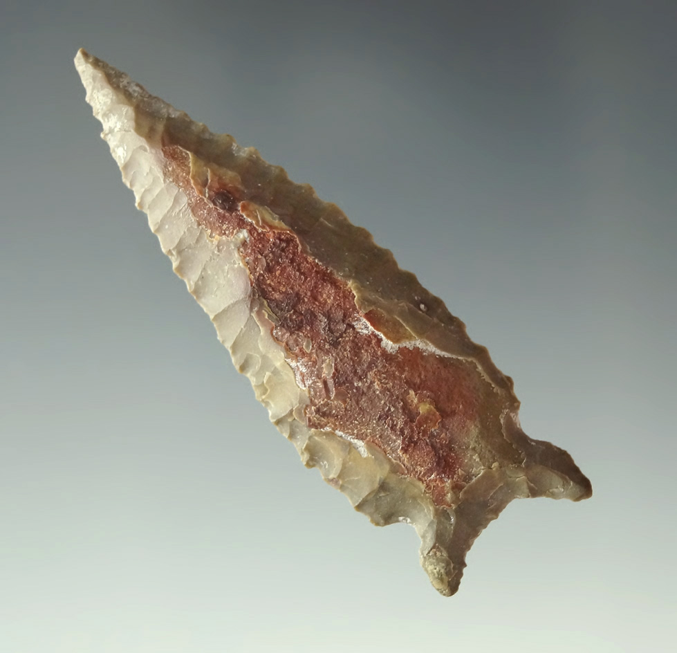 2 1/8" Buchanan Eared found in Oregon. Ex. Charlie Shewey collection. Slight curve to blade.