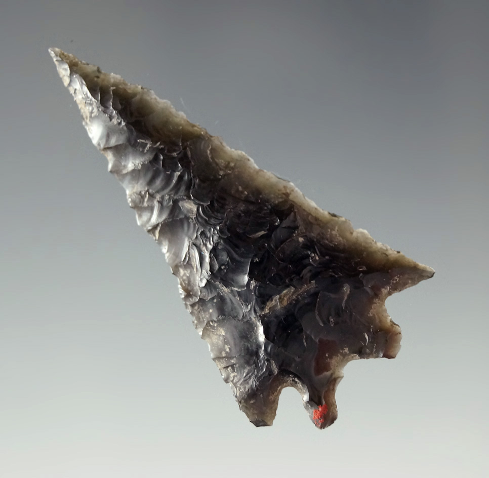 1 7/8" heavily patinated obsidian Elko Eared found in Oregon. Ex. Charles Shewey collection.