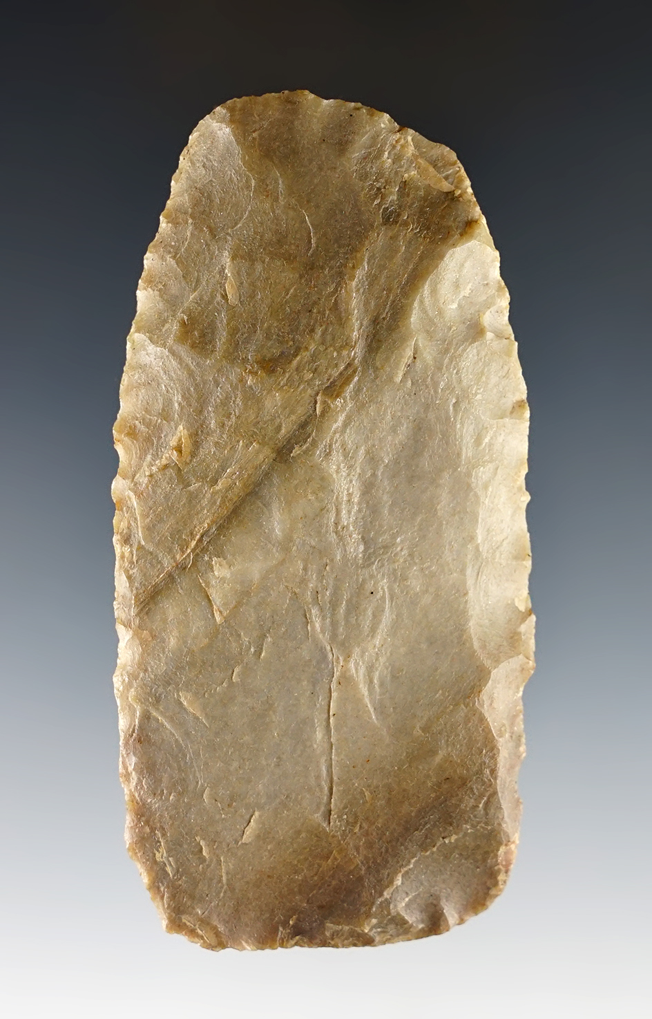 3 3/8" Paleo Knife that is well patinated. Found in Madison Co., Ohio. Ex. Bill Likens collection.