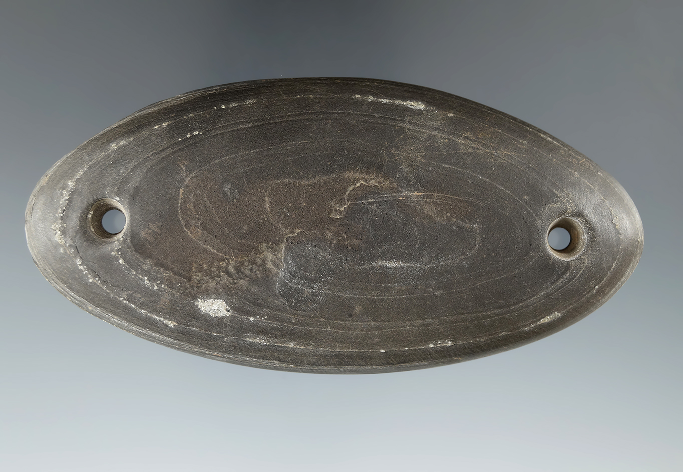 4 3/16" Glacial Kame Oval Cupped Gorget made from Cannal Coal, found in Scioto Co., Ohio.