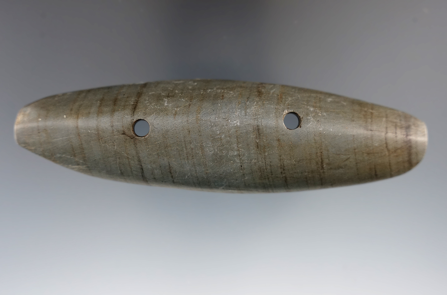 4 9/16" Glacial Kame Ridge Gorget made from Banded Slate, found in Miami Co., Ohio. Ex. B. Miller.