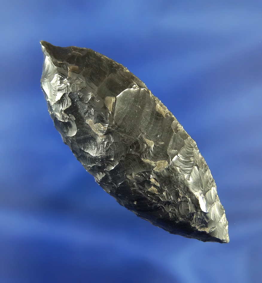 Very unique 2 7/8" Obsidian Uniface Knife with a graver spur on one end found in Oregon.