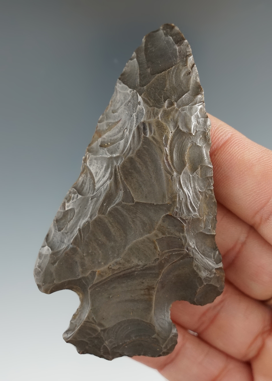 3 1/4" highly patinated Hornstone Archaic Cornernotch. Found in Indiana.