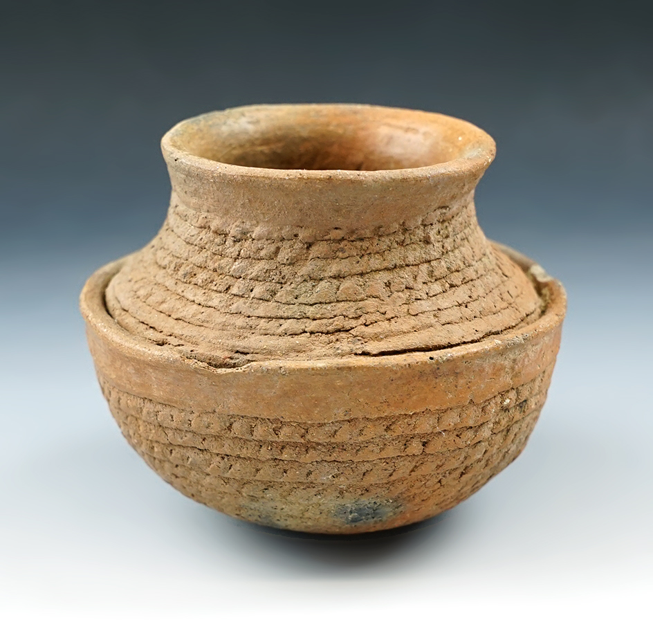 Uniquely styled 3 5/8" wide x 3" tall Southwestern pottery vessel in excellent condition. NM.