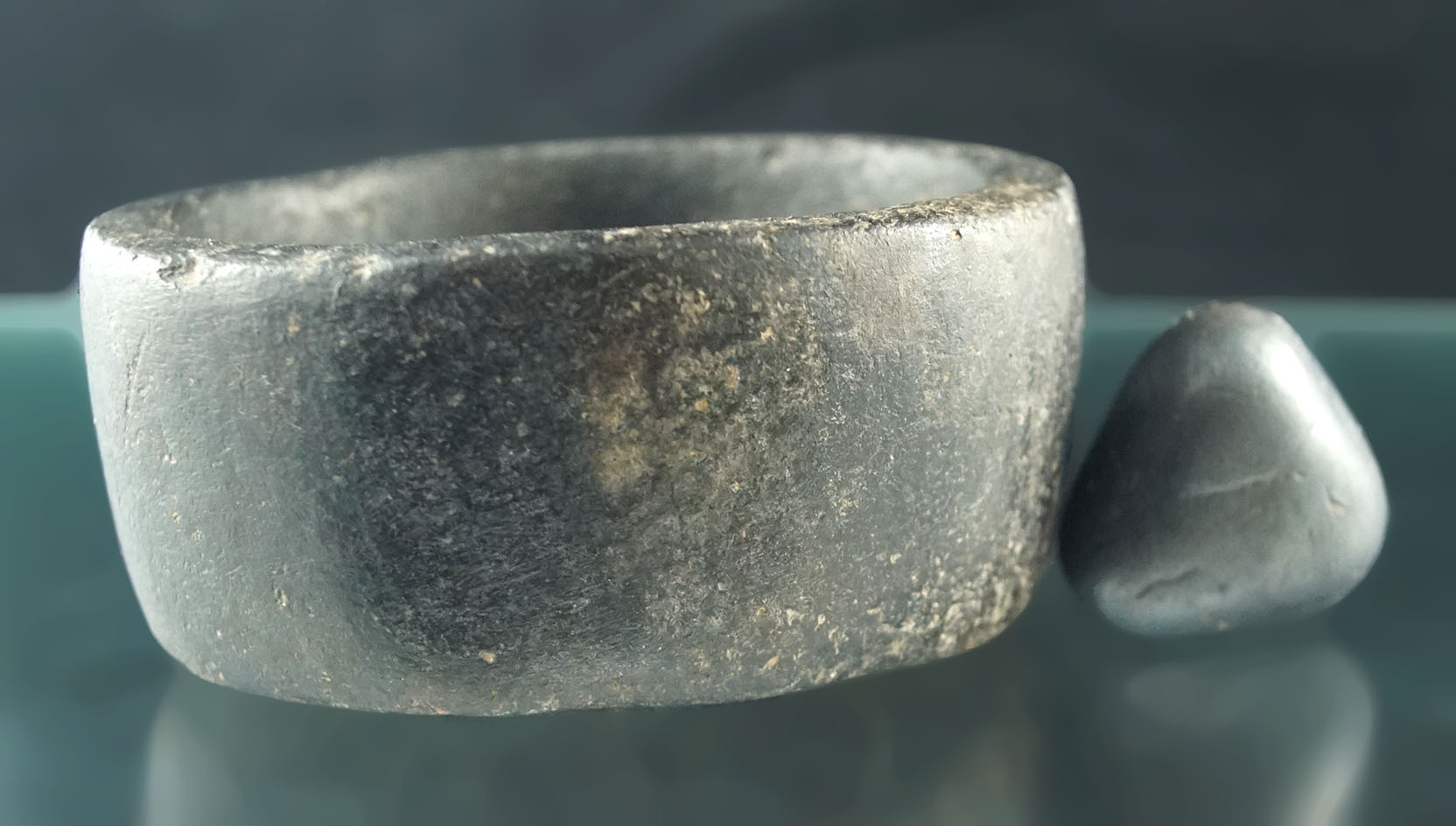 Fine stone mortar - medicine type - with a triangular stone collected in the Peruvian Highlands.