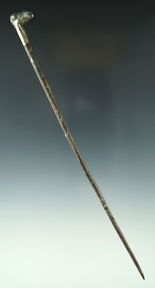 7 7/8" garment pin with a silver llama head effigy found in Cuzco Peru.