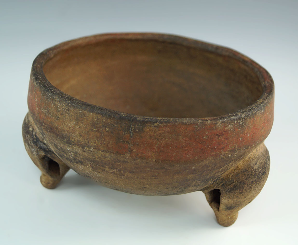 5 3/8" by 2 3/8 solid tripod bowl with a red band around the top found in Costa Rica.