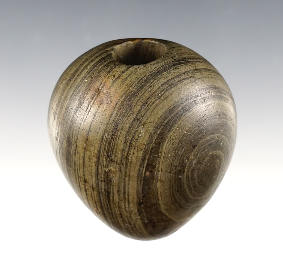 Exceptional 2 1/4" Ball Bannerstone found in Ohio. Slightly fluted on one face. Ex. Terry Elleman.