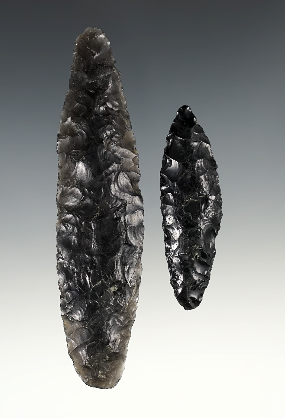 Pair of Obsidian Cascades found in Lake Co., Oregon. Largest is 4 5/8" and is broken and glued.