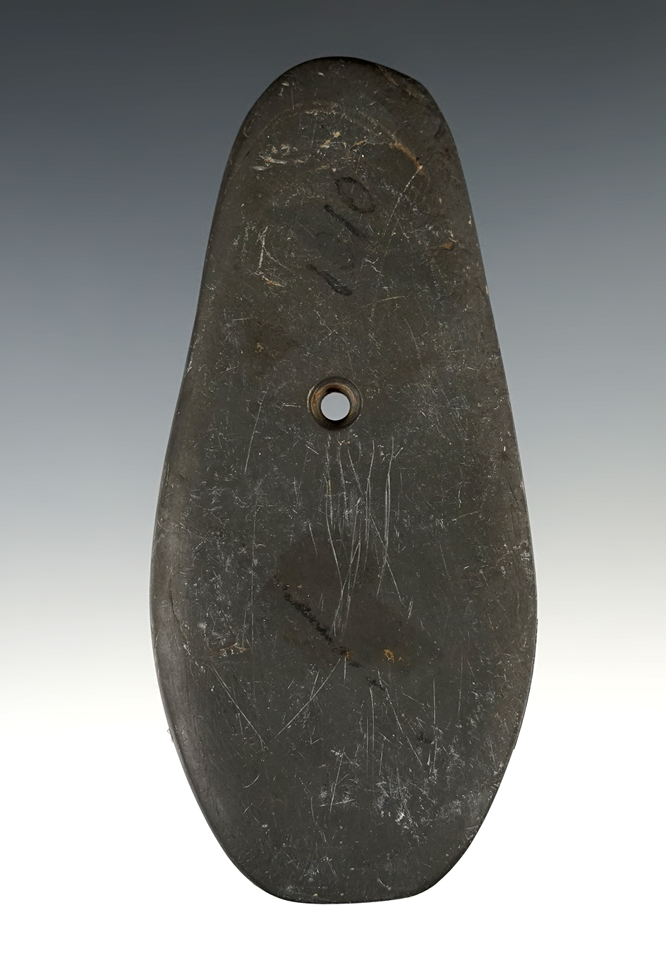 4 3/16" Hopewell Trapezoidal Pendant made from gray Slate. Found in Seneca Co., Ohio. Pictured.