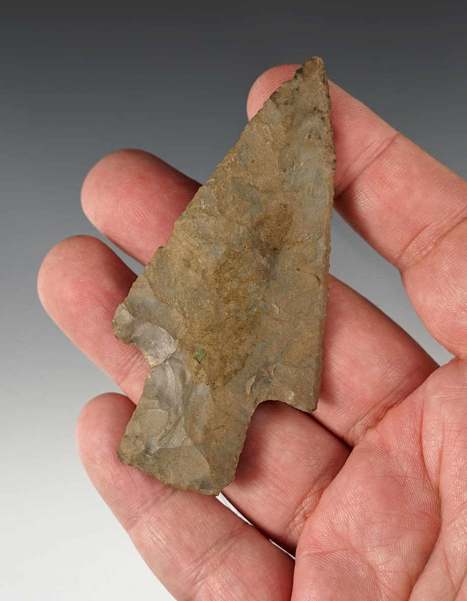 Finely made 3 3/8" Stemmed Point found in Kentucky. Excellent flaking on blade edges.