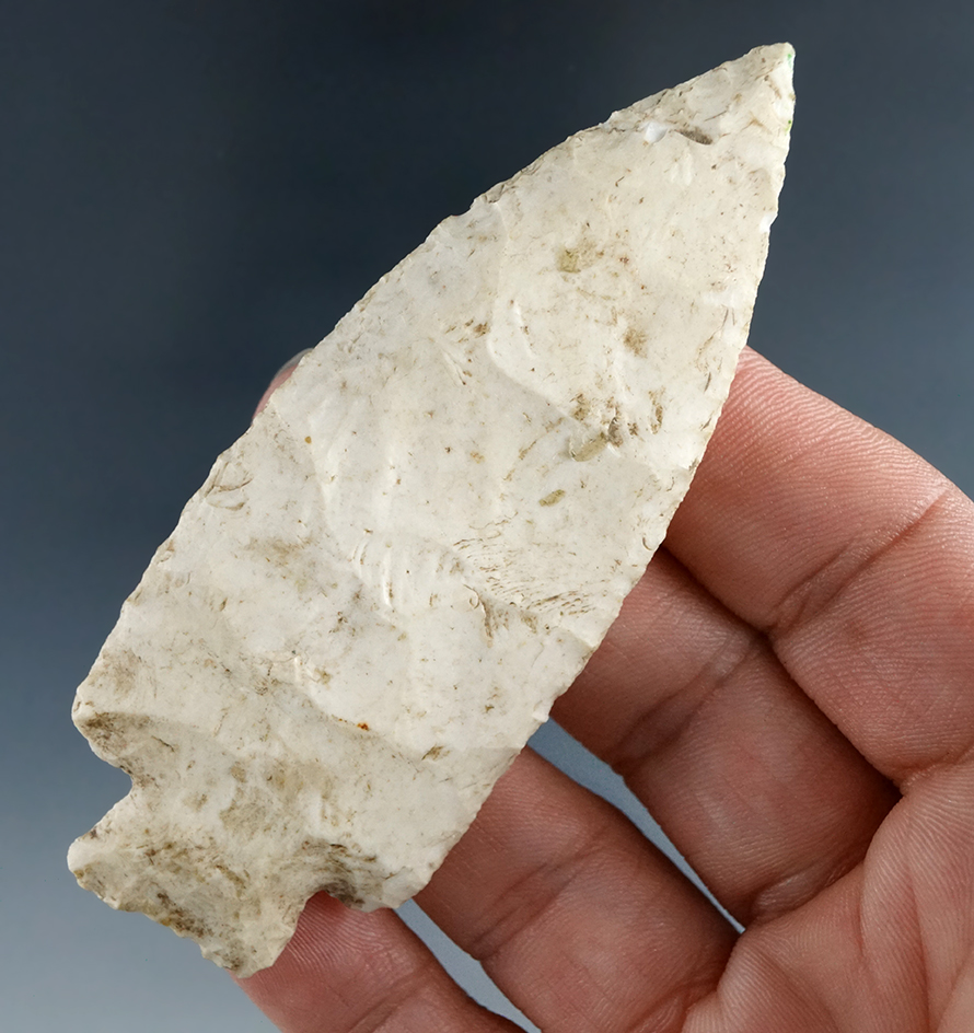 3 3/8" Archaic Stemmed Knife  that is well flaked and nicely beveled. Found in Missouri.