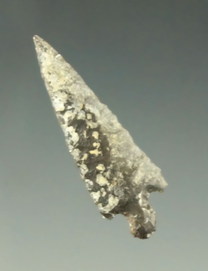 1 3/16" heavily patinated obsidian Rose Springs found in Oregon.