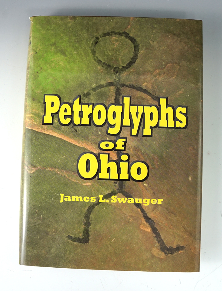 Hardcover book in excellent condition: "Petroglyphs of Ohio" by James Swauger.