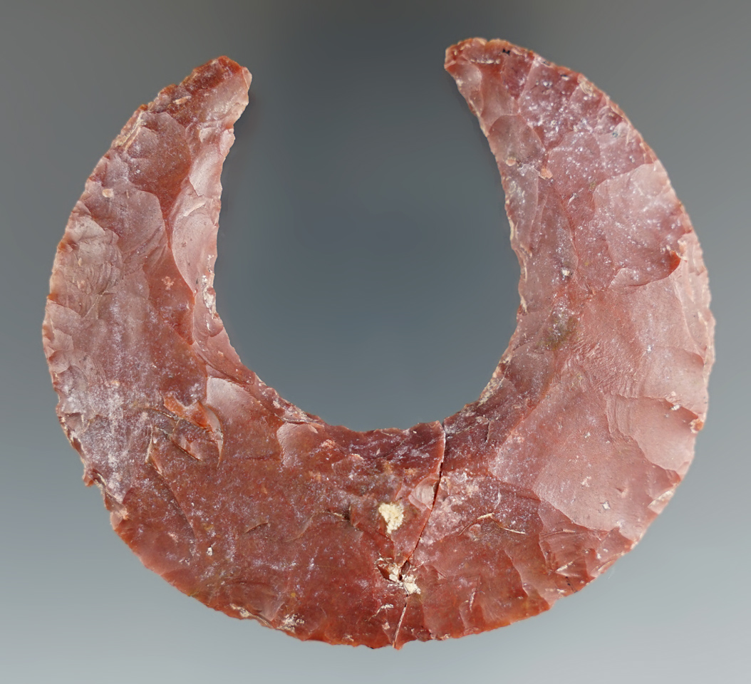 2 13/16" wide Mayan flint eccentric that is broken and glued in one place found in Guatemala.